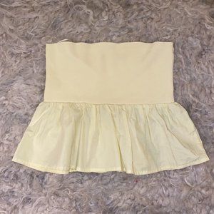 Pale yellow ruffled tube top